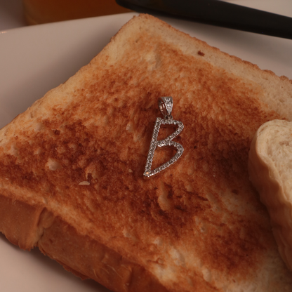 Letter B Marker Tag Sterling Silver Pendant on a Toast