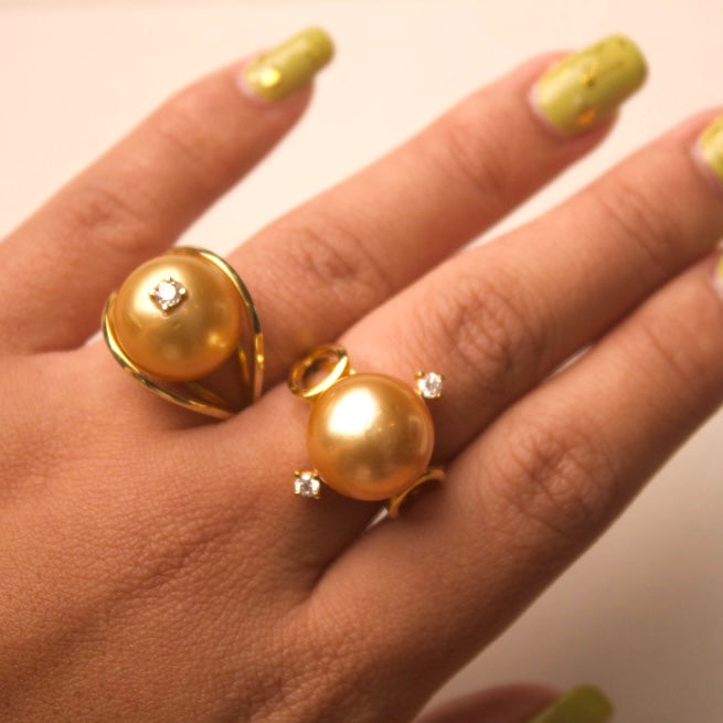 Hand wearing Melody Pearl Yellow Gold Ring